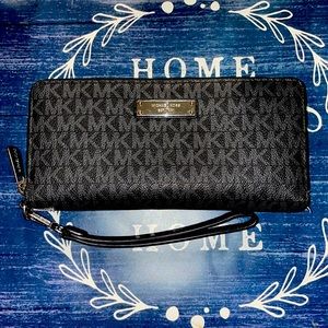 MK wallet with clutch strap